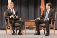  ?? U.S. Navy photo ?? As part of a three-day visit to Connecticu­t and Rhode Island, Secretary of Defense Ash Carter, left, speaks with students, staff and faculty at U.S. Naval War College in Newport Wednesday.