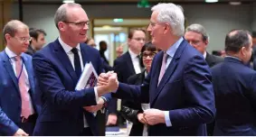  ??  ?? Foreign Affairs Minister Simon Coveney with EU chief negotiator Michel Barnier