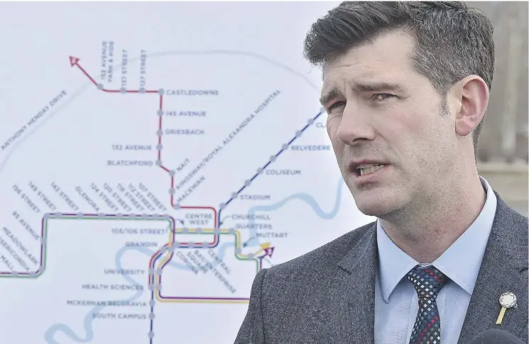  ?? ED KAISER ?? Mayor Don Iveson — with a map of LRT routes as a backdrop — pushes for provincial budget money for LRT during a press event at the Lewis Farms Estates bus station Thursday.