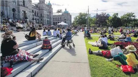  ?? DARREN STONE, TIMES COLONIST ?? People gather in memory of Chantel Moore at the B.C. legislatur­e on Thursday.