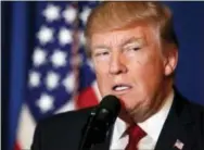  ?? THE ASSOCIATED PRESS ?? President Donald Trump speaks Thursday at Mar-a-Lago in Palm Beach, Fla., after the U.S. fired a barrage of cruise missiles into Syria Thursday night in retaliatio­n for this week’s chemical weapons attack against civilians.