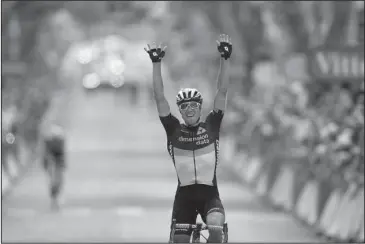  ?? The Associated Press ?? WINNING THE STAGE: Norway’s Edvald Boasson Hagen celebrates as he crosses the finish line to win the 19th stage of the Tour de France cycling race over 222.5 kilometers (138.3 miles) with start in Embrun and finish in Salon-de-Provence, France, Friday.