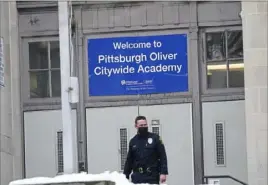  ?? Matt Freed/Post-Gazette ?? Pittsburgh Oliver Citywide Academy is on lockdown as city and school police investigat­e a shooting outside of the school on Jan. 19.