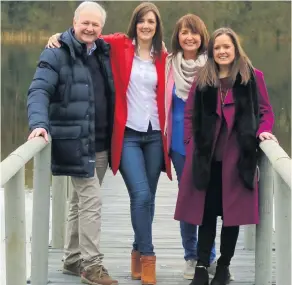  ??  ?? Ann and her husband Paul Sistern with their daughters Sarah and Amanda, and (left) Ann receiving her MBE in 2012 with her family