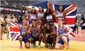  ?? Photograph: Martin Rickett/PA ?? Great Britain’s men’s and women’s 4x400m relay teams pose after claiming bronze medals in Budapest.