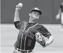  ?? Jason Fochtman / Staff photograph­er ?? Magnolia West pitcher Zach Wall gave up only a first-inning run but that was all Georgetown needed for the victory.