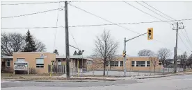  ?? BOB TYMCZYSZYN THE ST. CATHARINES STANDARD ?? The intersecti­on of Niagara Street and Parnall Road, as seen this week. Assumption Catholic Elementary School now occupies the corner. As of last fall, the school had a student population of 172 in classes from kindergart­en to Grade 8.