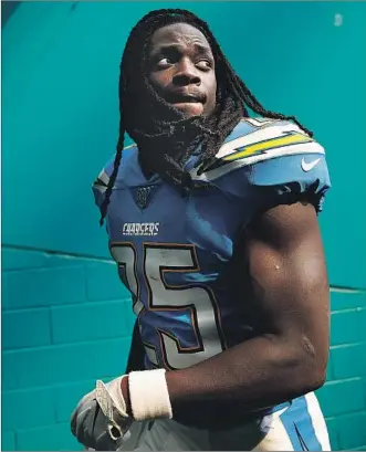  ?? Michael Reaves Getty Images ?? “NO ONE CARED that Melvin Gordon was out,” the Chargers’ running back said. After failing in a bid to get a contract extension, Gordon will begin his season Sunday against the Denver Broncos.