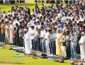 ?? U-T ?? In this 2016 photo, hundreds of worshipers from San Diego’s Muslim community, led by Imam Sheikh Issam from Egypt, mark the end of the month-long observance of Ramadan.