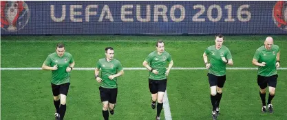  ??  ?? Dream come true Bobby, far right, warming up with Willie Collum’s team ahead of the Turkey v Czech Republic clash on June 21