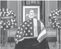  ?? SHAWN THEW/POOL VIA AP ?? Justice Ruth Bader Ginsburg lies in state at Statuary Hall of the U.S. Capitol, the first woman and Jewish person so honored.