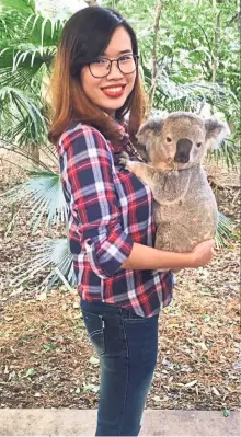  ??  ?? Lone Pine Koala Sanctuary has a designated koala holding area that allows visitors to cuddle the creatures and takes photos with them.