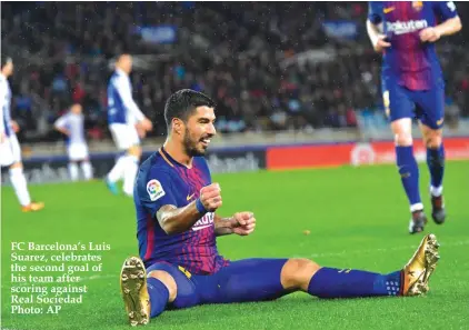  ??  ?? FC Barcelona’s Luis Suarez, celebrates the second goal of his team after scoring against Real Sociedad Photo: AP