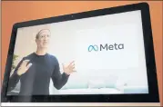  ?? ERIC RISBERG — THE ASSOCIATED PRESS ?? Seen on the screen of a device in Sausalito, Facebook CEO Mark Zuckerberg announces the new company name, Meta, during a virtual event on Thursday.