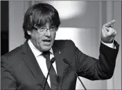  ?? ASSOCIATED PRESS ?? OUSTED CATALAN LEADER Carles Puigdemont addresses Catalan mayors who travelled to Brussels to take part in an event in support of the ousted Catalan government in Brussels, Belgium on Tuesday.