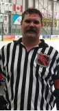  ?? GREG HARDER ?? Luke McGeough wears the NHL jersey of his late father, former referee Mick McGeough, before calling a game on Wednesday in Regina.