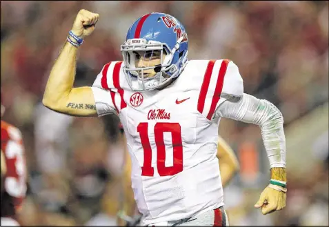  ?? KEVIN C. COX / GETTY IMAGES ?? Among the conference’s projected starting quarterbac­ks, only Ole Miss’ Chad Kelly ranked among the top 25 in the country last year with his 4,000-yard season. He led the SEC with 31 touchdown passes.