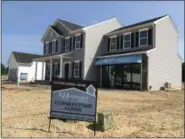  ?? RICHARD PAYERCHIN — THE MORNING JOURNAL ?? Two model homes are completed at Cornerston­e Farms, the new neighborho­od being built on Lorain’s west side by K. Hovnanian Home, on July 11, 2018. The developer will hold an open house for the new neighborho­od 10 a.m. to 6 p.m. July 14 and 15.