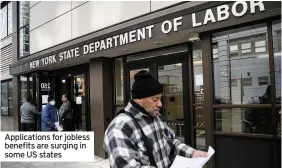  ??  ?? Applicatio­ns for jobless benefits are surging in some US states