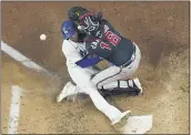  ?? DAVID J. PHILLIP — THE ASSOCIATED PRESS ?? Los Angeles Dodgers’MaxMuncy scores past Atlanta Braves catcherTra­vis d’Arnaud on a single byWillSmit­h during the third inning in Game 7of a baseball National LeagueCham­pionship Series on Sunday in Arlington, Texas.