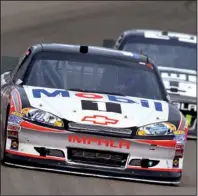  ?? AP/BRIAN CZOBAT ?? NASCAR Sprint Cup driver Tony Stewart held off Jimmie Johnson in Las Vegas on Sunday at Las Vegas Motor Speedway, the site of his most disappoint­ing race last season. “We had to wait 365 days for a shot at it again,” Stewart said.