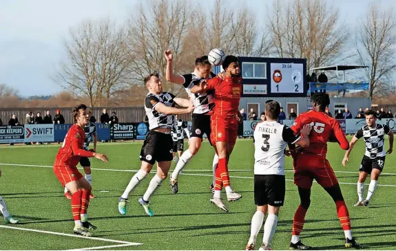  ?? ?? Gateshead midfield man Dan Ward contests a high ball during the 4-2 win at Gloucester