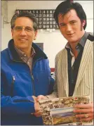  ??  ?? In this 2012 file photo, Penticton Mayor Dan Ashton congratule­s Adam Fitzpatric­k on his first win as a profession­al Elvis tribute artist.