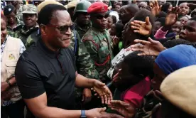  ?? ?? President Chakwera visiting flood victims in Blantyre, Malawi. Photograph: Esa Alexander/Reuters