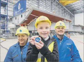  ?? ?? TRADITION Josh Duffy, seven, designed a coin placed under HMS Venturer’s keel for good luck Inset below: A CGI rendering of how the new frigates will look