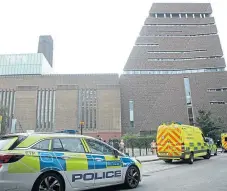  ?? Picture: PA ?? Emergency crews attend the scene at the Tate Modern after a child fell five storeys.