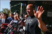  ?? RAY CHAVEZ — STAFF PHOTOGRAPH­ER ?? At a protest of Oakland business owners in September, Derreck Johnson, founder of Home of Chicken and Waffles in Jack London Square, speaks out about the lawlessnes­s that is scaring off his customers and forcing him to cut staff and shorten hours.