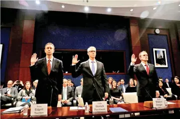  ?? — Reuters photo ?? Twitter acting general counsel Sean Edgett, Stretch and Google senior vice-president and general counsel KentWalker are sworn in before the House Intelligen­ce Committee to answer questions related to Russian use of social media to influence US...