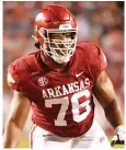  ?? Michael Woods/AP ?? Left tackle Myron Cunningham was one of seven seniors opting to return for another season under Sam Pittman.
