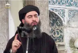  ??  ?? An image grab taken from a propaganda video released on July 5, 2014 by Al-Furqan Media allegedly shows the leader of the Islamic State (IS) group Abu Bakr Al-Baghdadi, aka Caliph Ibrahim, addressing Muslim worshipper­s at a mosque in the militant-held northern Iraqi city of Mosul.