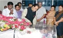  ?? — DC ?? T. Subbarami Reddy pays floral tribute to C. Narayana Reddy.