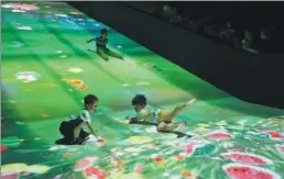  ?? PROVIDED TO CHINA DAILY ?? A child-friendly exhibition titled Future Park created by the Japanese art collective teamLab enthralls visitors in Wuhan.