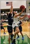  ??  ?? Humboldt’s Gabrielle Carbajal scores after securing a steal in Thursday’s win.