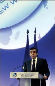  ?? AP/REMY DE LA MAUVINIERE ?? French Prime Minister Francois Fillon opens the “New World” conference Thursday in Paris. Fillon promised that France would reduce the taxes companies pay on salaries to help reduce unemployme­nt.