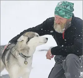  ?? Lynn curWin/tc media ?? Bret Mavriik and Nymeria took a short break during their cross-Canada walk when they arrived in Truro.