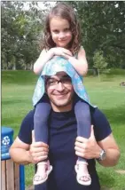  ?? The Canadian Press ?? Mahdi Ebrahimi Kahou and his stepdaught­er, Ailey Shaw, 5, are seen in this undated handout photo. Mahdi Ebrahimi Kahou is an Iranian student at the University of Minnesota who is applying to Canadian universiti­es after being affected by U.S. President...