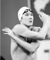  ?? - AFP photo ?? (FILES) This file photo taken on July 26, 2011 shows South Korea’s Park Tae Hwan warming up prior to competing in the final of the men’s 200-metre
freestyle swimming event in the FINA World Championsh­ips at the indoor stadium of the Oriental Sports...
