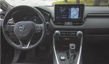  ??  ?? The interior of the 2019 RAV4 Hybrid.