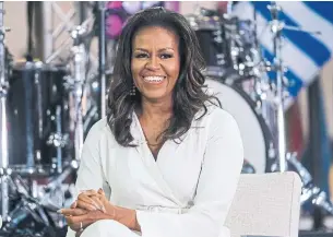  ?? CHARLES SYKES INVISION/THE ASSOCIATED PRESS ?? In her new book, Becoming, Michelle Obama blasts U.S. President Donald Trump.