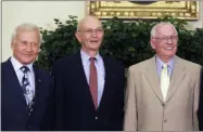  ?? ALEX BRANDON — THE ASSOCIATED PRESS ?? In this file photo, Apollo 11 astronauts, from left, Buzz Aldrin, Michael Collins and Neil Armstrong stand in the Oval Office at the White House in Washington, on the 40th anniversar­y of the mission’s moon landing.