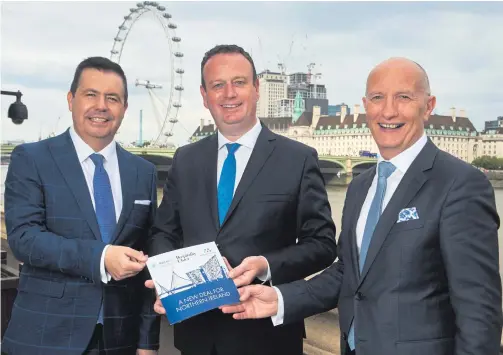  ?? SIMON JACOBS ?? Glyn Roberts, CEO of Retail NI; Stephen Kelly, CEO of Manufactur­ing NI, and Colin Neill, CEO of Hospitalit­y Ulster, launch a New Deal for Northern Ireland policy document at an event at the House of Commons, London