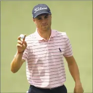  ?? Patrick Smith / Getty Images ?? Justin Thomas waves to the crowd during the second round of the Masters at Augusta National Golf Club on April 6.