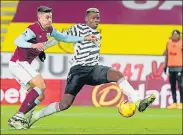  ??  ?? Manchester United's Paul Pogba tries to control the ball during his team’s EPL match against Burnley on Tuesday.