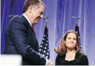  ?? THE CANADIAN PRESS/ THE ASSOCIATED PRESS/FILES ?? U.S. Trade Representa­tive Robert Lighthizer shakes hands with Foreign Affairs Minister Chrystia Freeland at the start of NAFTA renegotiat­ions in Washington.