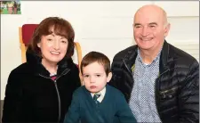  ?? Photo by Michelle Cooper Galvin. ?? Marcus O’Neill with his grandparen­ts – Mary and Kenneth O’Neill – enjoying the Grandparen­ts Day in Nagle Rice Primary School, Milltown.