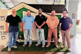  ?? Courtesy of GHBA ?? Toll Brothers Project Playhouse builder and move-in crew delivered Imaginatio­n Station to Section 134 at Minute Maid Park on June 30 to be on display during the Astros games.